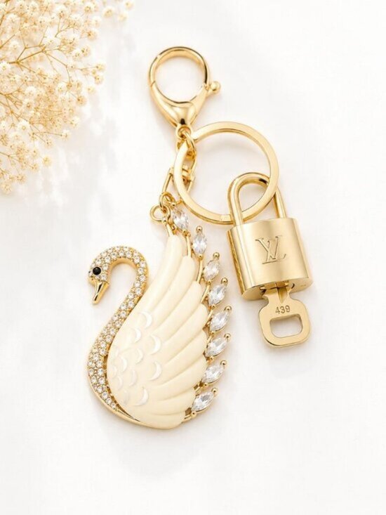 Louis Vuitton Accessories - LV Gold Padlock Authentic 🔑 Luxury Bag Charm w/ Unbranded Swan Keychain